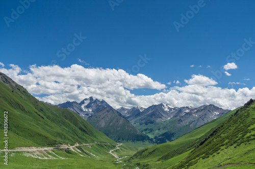 Mountains and grasslands along G217 highway in Xinjiang, China in summer © starxm