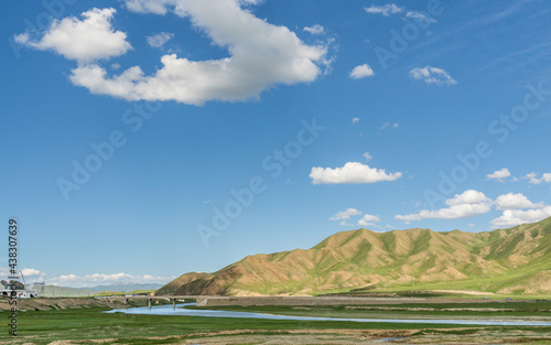 Mountains and grasslands along G217 highway in Xinjiang, China in summer