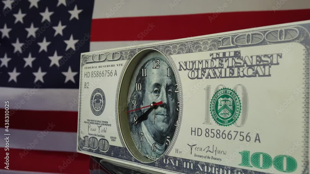 100dollar bill in the form of a watch, on the background of the flag
