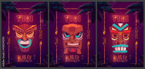 Tiki bar cartoon ad posters with tribal masks in bamboo frames and palm leaves. Promo posters for beach hut bar food and drink, signboards with glowing fonts for amusement establishment Vector banners
