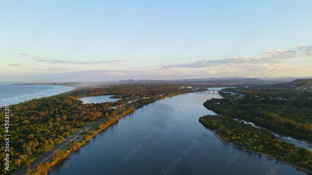 Tweed River With Calm Water At Sunset - Fingal Head And Tonys Island In Banora Point, NSW, Australia. - aerial Tweed River With Calm Water At Sunset - Fingal Head And Tonys Island In Banora Point, NSW, Australia. - aerial