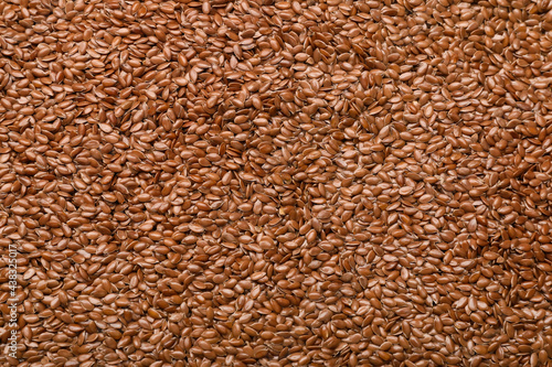 Many flax seeds as background photo