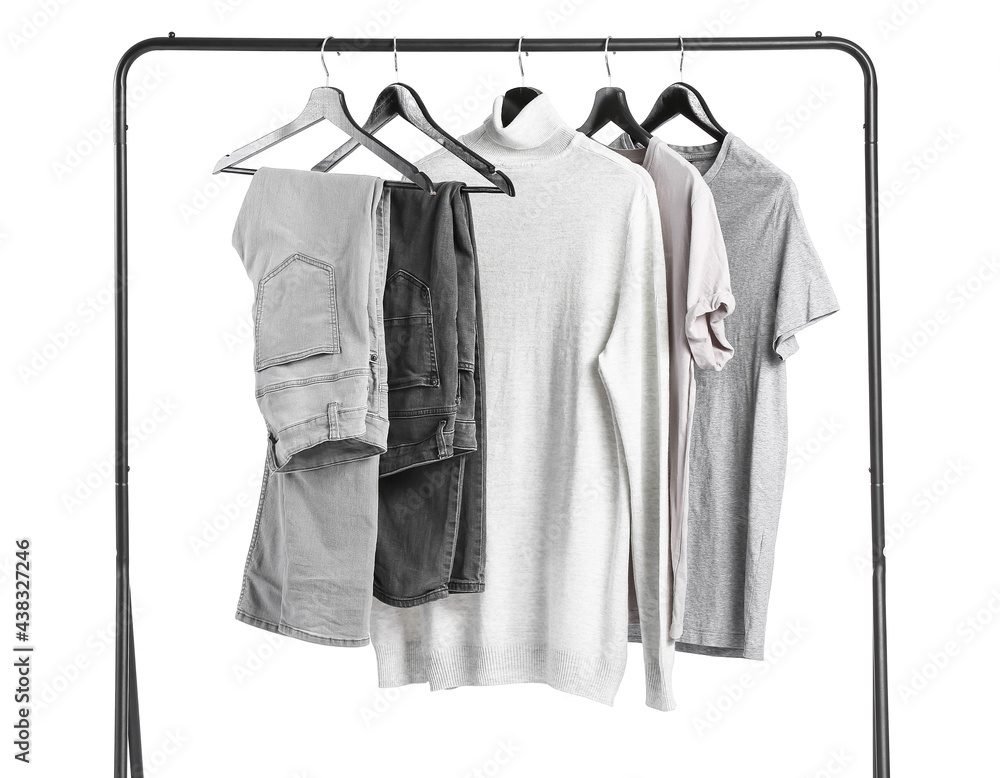 Rack with modern clothes on white background Rack with modern clothes on white background
