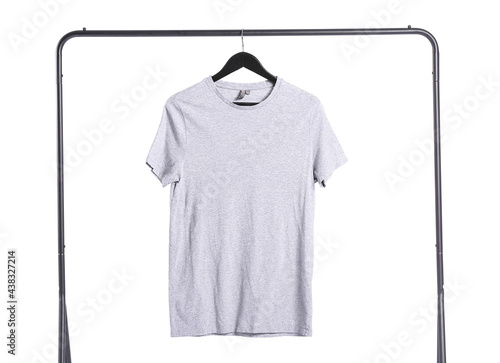 Rack with t-shirt on white background
