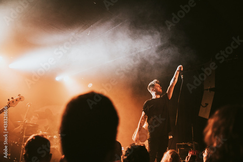 Foto Rock band playing a concert at a live house in Europe