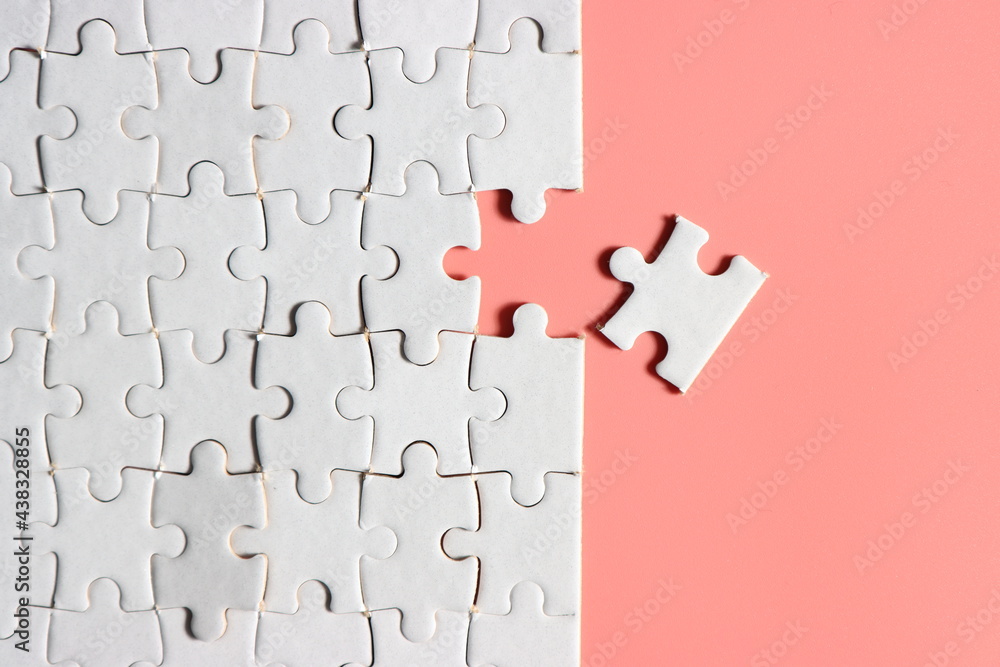 Jigsaw puzzle with missing piece. Missing puzzle pieces. Concept image of unfinished task