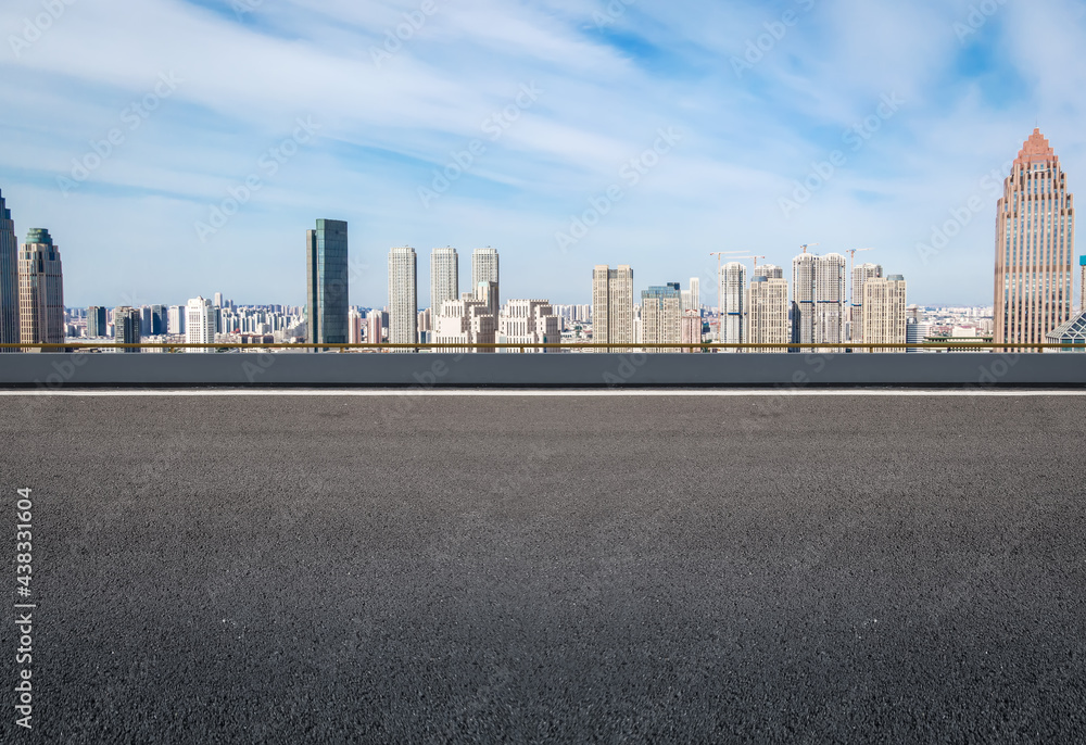 Asphalt ground and urban architectural landscape Asphalt ground and urban architectural landscape