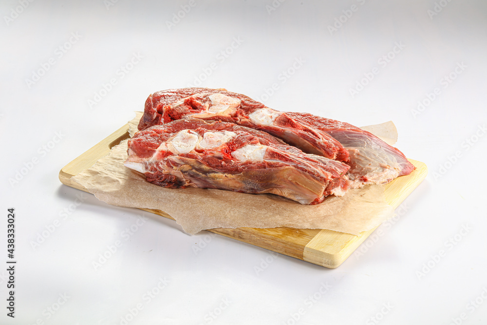 Raw bones for cooking over board