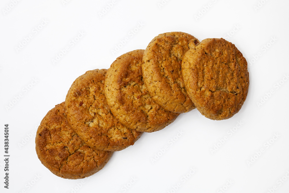 Row of five oatmeal cookies. Isolated. Top view, flatlay. Row of five oatmeal cookies. Isolated. Top view, flatlay.