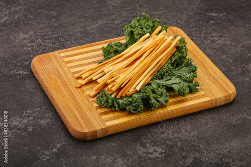 Chechel cheese sticks over board photo