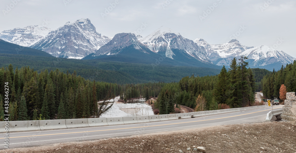 Winter view of Morant's Curve Railway and Rocky montains in Banff National Park, Alberta, Canada.