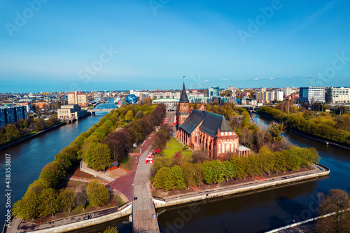 Aerial top view Cathedral and park Kant Island city Kaliningrad Russia with blue sky