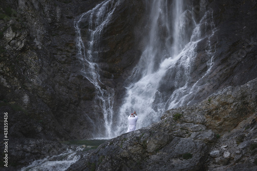 European Shugendo monk in traditional outfit hiking in the Austrian mountains, Austrian, Ötscher photo