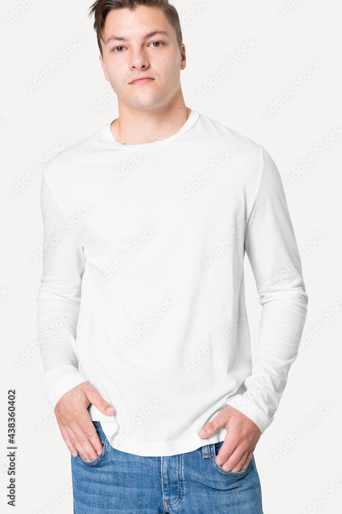 Man in white long sleeve tee men’s fashion studio portrait Man in white long sleeve tee men’s fashion studio portrait