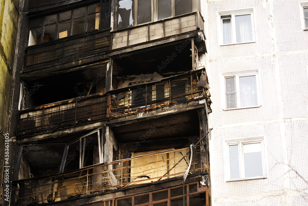 burnt walls of a tall house