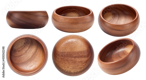 Empty wooden bowl isolated on white background.