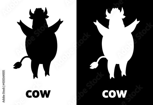 Cow in black and white shadow with letter of the animal