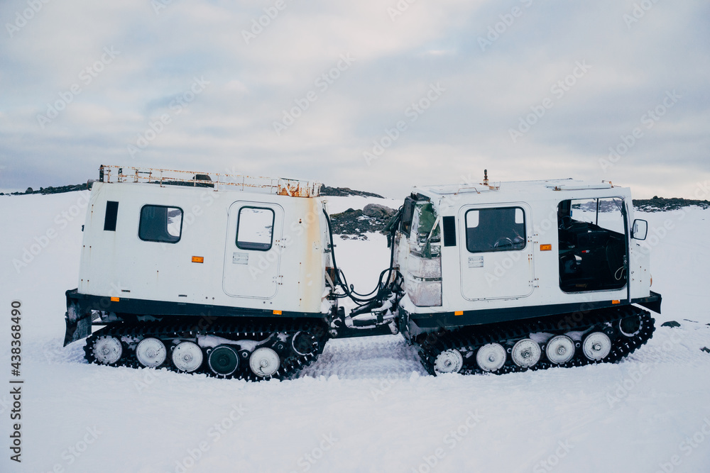 Heavy vehicle in snowy countryside Heavy vehicle in snowy countryside