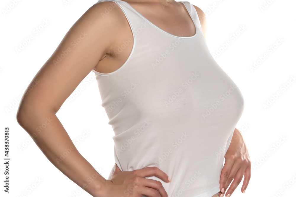 a woman with big breasts without a bra in a white shir a woman with big breasts without a bra in a white shir