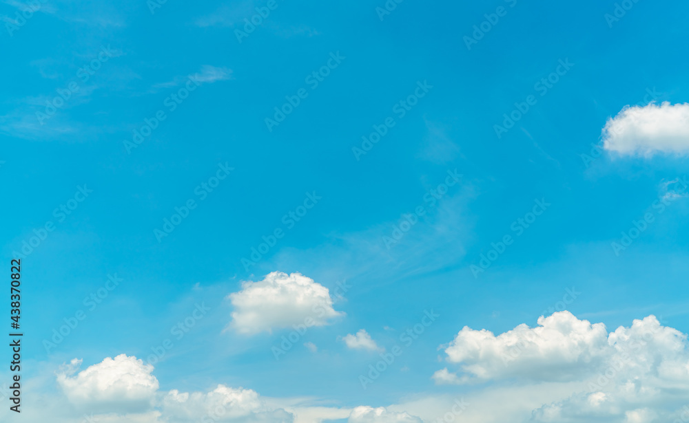 White fluffy cumulus clouds on blue sky with copy space for text. White puffy cloudscape. Beauty in nature. Close-up white cumulus clouds texture background. Sky on sunny day. Pure white clouds. White fluffy cumulus clouds on blue sky with copy space for text. White puffy cloudscape. Beauty in nature. Close-up white cumulus clouds texture background. Sky on sunny day. Pure white clouds.
