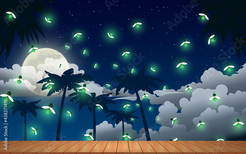 wooden table and firefly flying in the jungle in the full moon night