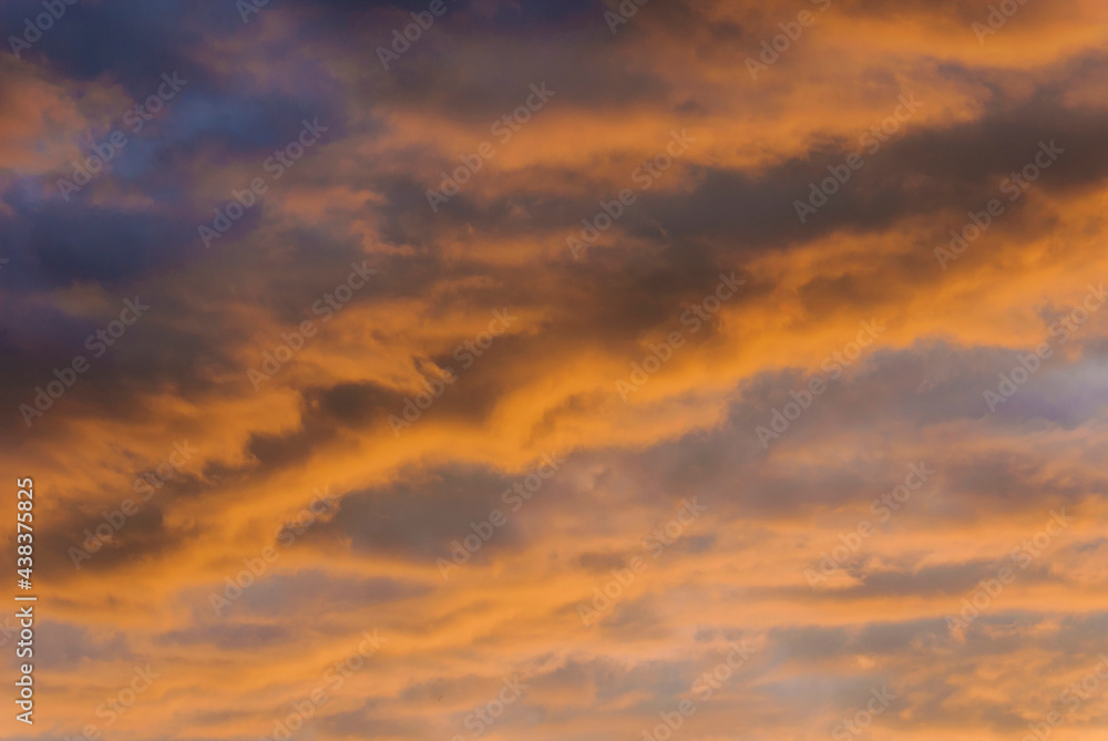Sunset sky and clouds with beautiful colors as background