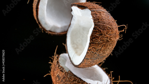 Cracked coconuts falling do...