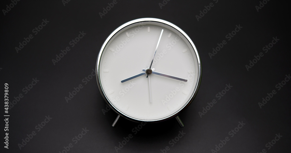 Silver Alarm clock isolated on black background, Showtime 08.17 am or pm. Silver Alarm clock isolated on black background, Showtime 08.17 am or pm.