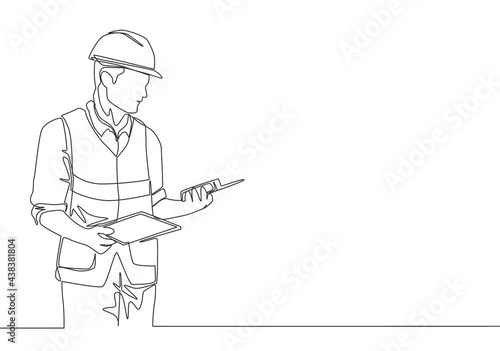 One continuous line drawing of young handsome foreman holding tablet and walkie talkie. Home renovation service concept single line draw design illustration