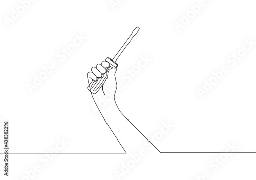 One continuous line drawing of man holding hand screwdriver. Single line draw vector design illustration