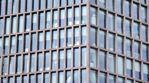 Abstract fragment of contemporary architecture  walls made of glass and concrete.
