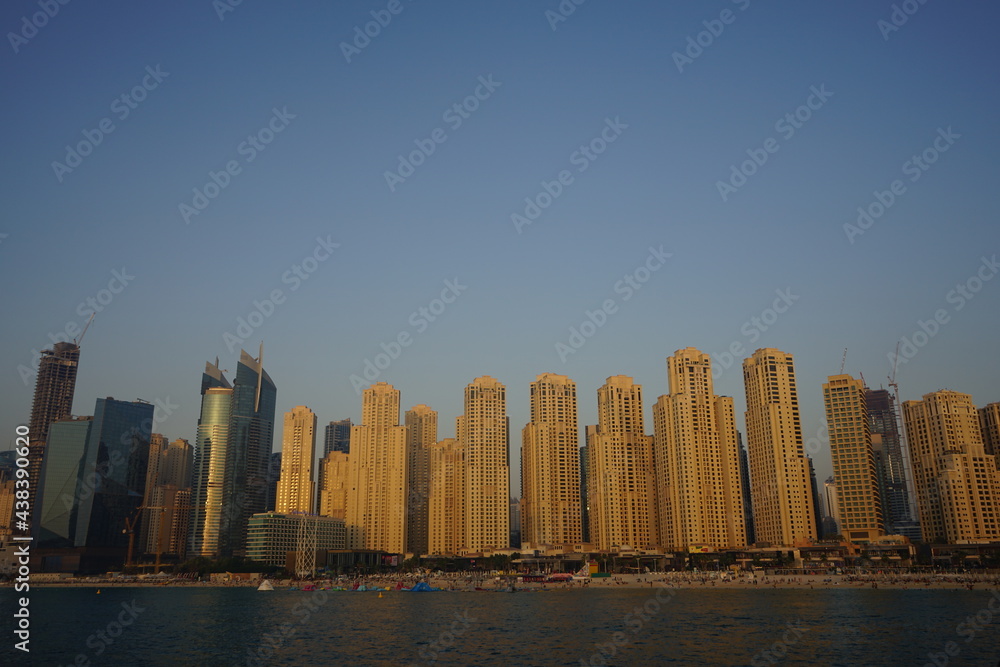 Fototapeta premium Sunset view on buildings in Dubai Marina