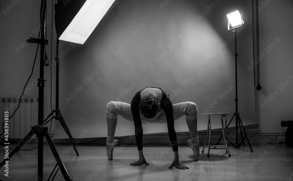 Dancer in a studio combining different types of dance styles.