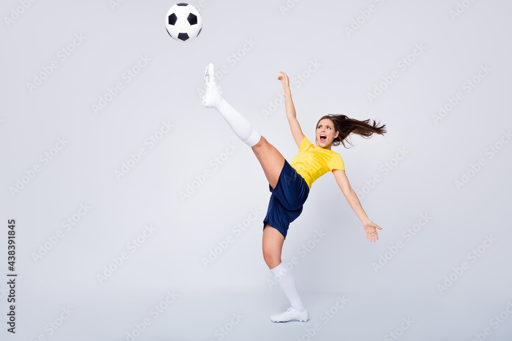 Full length photo energetic soccer player girl last hope for 2020 world championship match kick ball high try score goal wear white national team uniform kit isolated grey color background