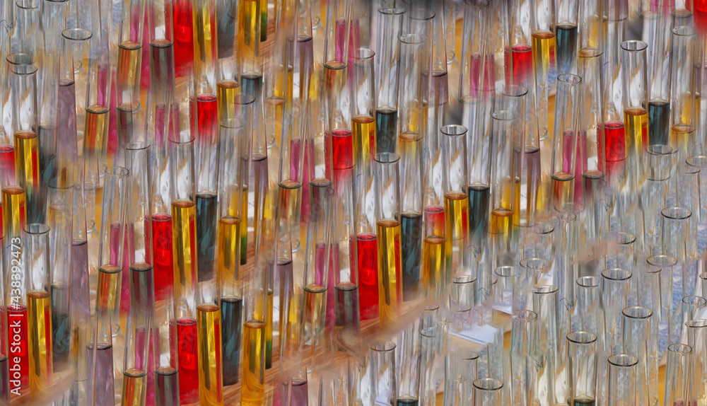 Chemical background from multicolored test tubes. Laboratory banner. Different bright liquids in a glass test tube