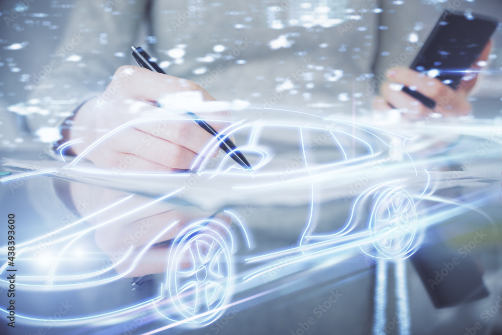 Double exposure of automobile icon hologram and woman holding and using a mobile device. Technology concept. Double exposure of automobile icon hologram and woman holding and using a mobile device. Technology concept.