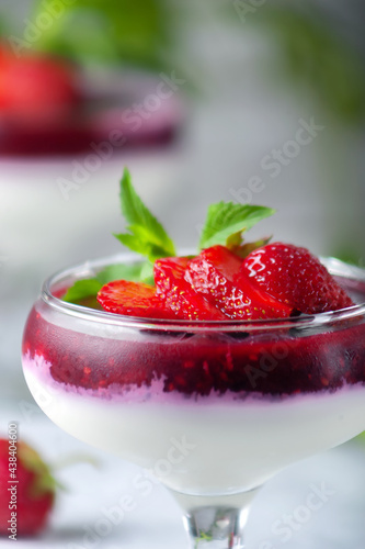 Wallpaper Mural Traditional Italian dessert vanilla strawberry panna cotta in verina with fresh berries. Copy space. Torontodigital.ca