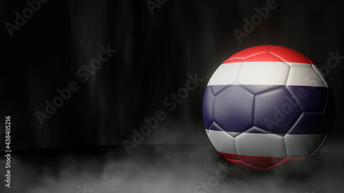 Soccer ball in flag colors on a dark abstract background. Thailand. 3D image.