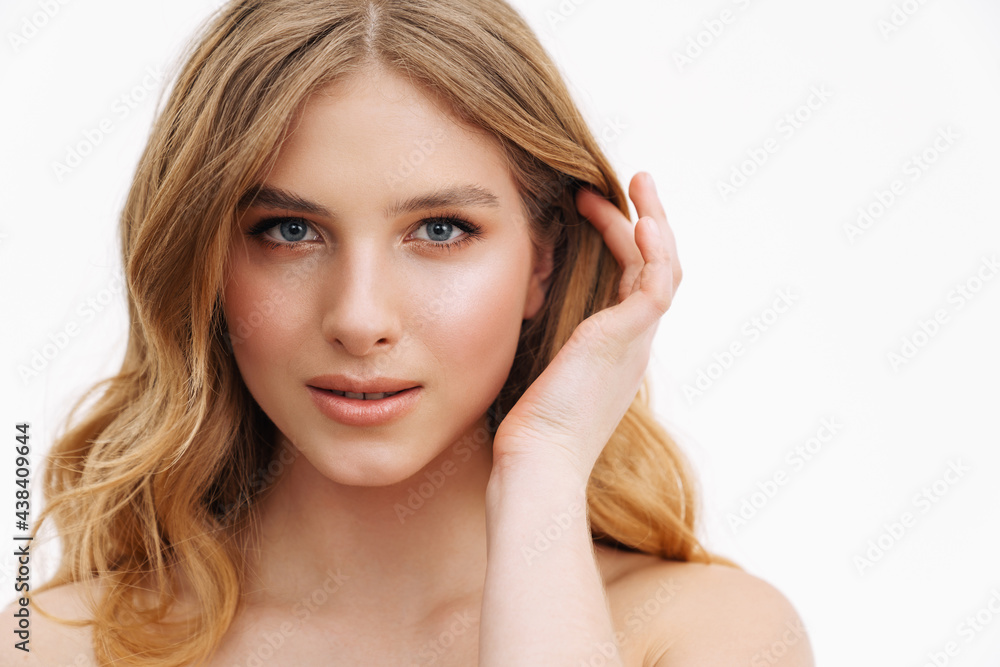 Half-naked ginger woman posing and looking at camera Half-naked ginger woman posing and looking at camera