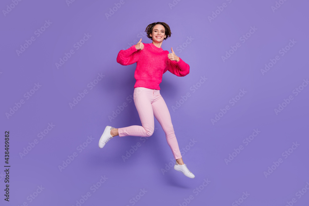 Full body photo of cheerful girl have fun show two thumbs up wear trousers shoes isolated on violet color background