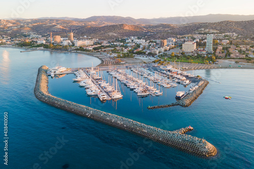 Aerial view of beach coast with boats near hotel in Cyprus