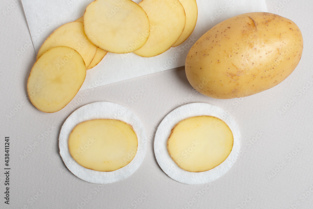 Sliced Potatoes prepared for cosmetic procedures.