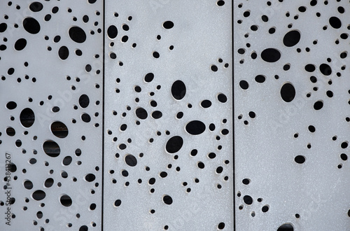 texture of holes in facade