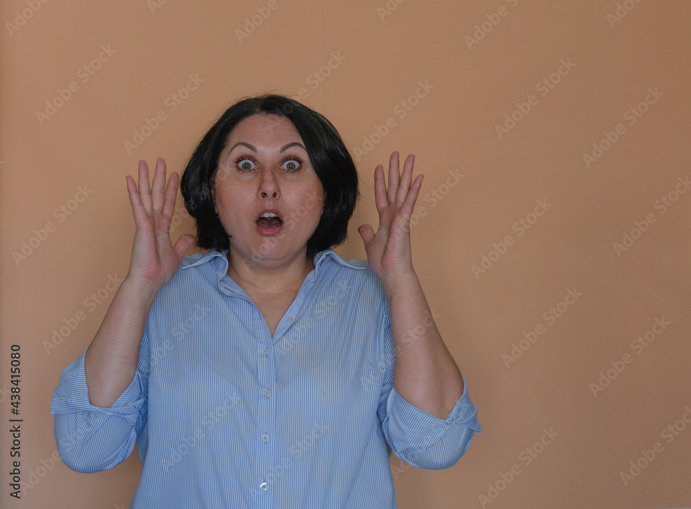 Portrait of a girl on a light background. Emotions
Portrait of a girl on a light background. Emotions