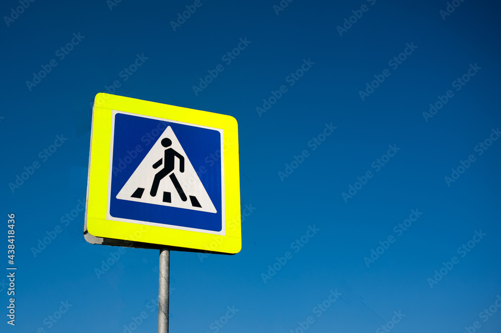 traffic sign - pedestrian crossing road against the sky traffic sign - pedestrian crossing road against the sky