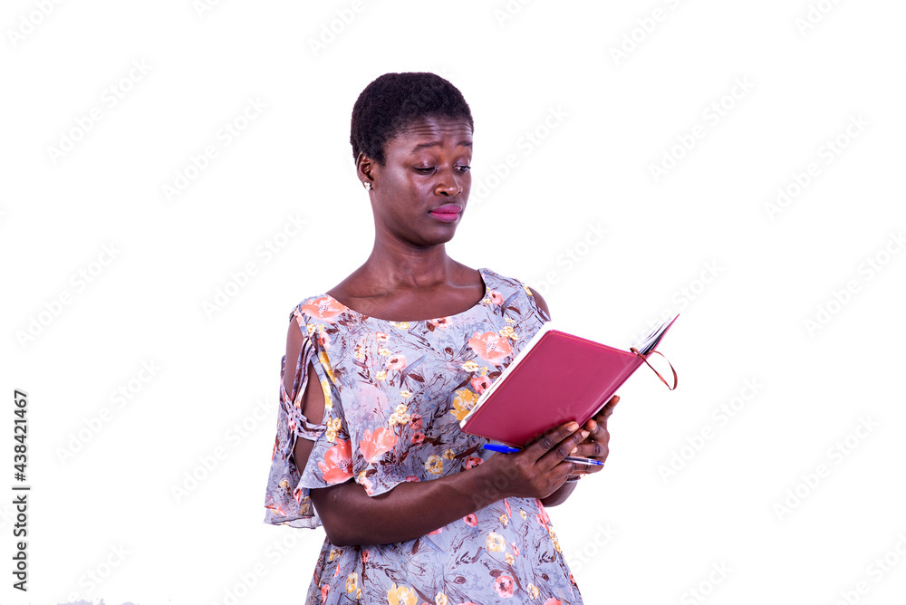 beautiful young serious student woman reading her book. beautiful young serious student woman reading her book.