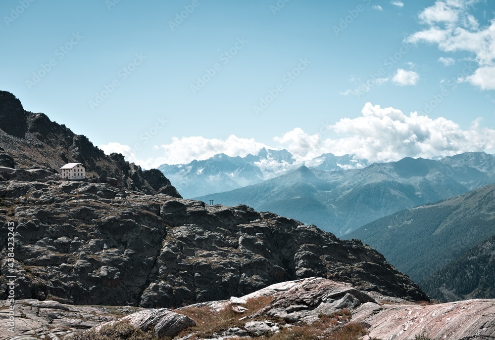 Panoramic view from a mountain peak in the italian Alps on a summer day (Trentino, Italy, Europe)
