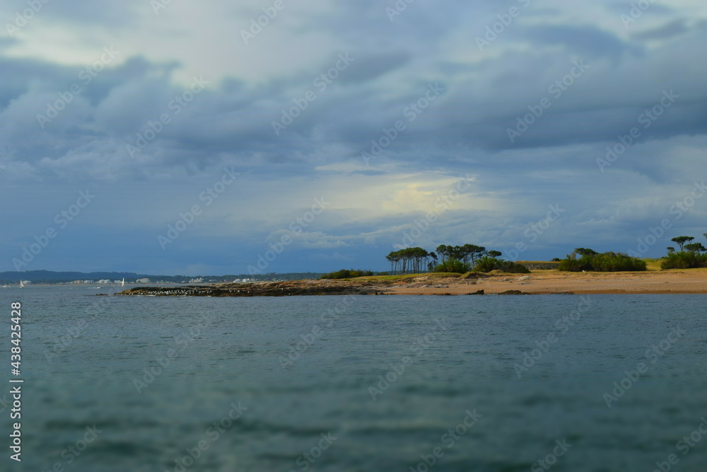 cloudy island in the ocean cloudy island in the ocean