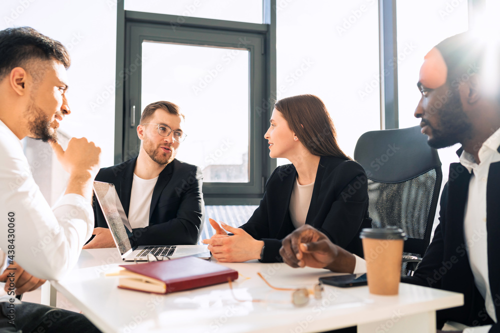 Office workers at the morning conference in the office Office workers at the morning conference in the office