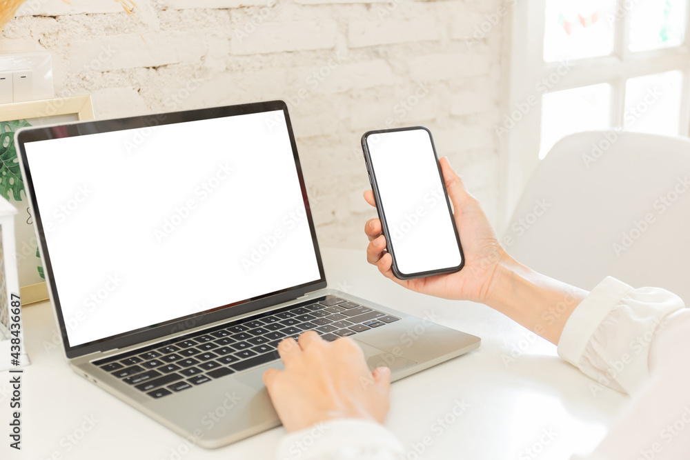 computer screen,cell phone blank mockup.hand woman work using laptop texting mobile.white background for advertising,contact business search information on desk in cafe.marketing,design computer screen,cell phone blank mockup.hand woman work using laptop texting mobile.white background for advertising,contact business search information on desk in cafe.marketing,design